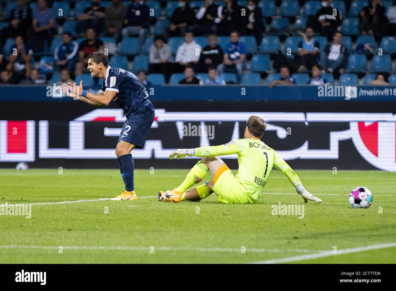 Bochum, Germany. 21st Sep, 2020. Football: 2nd Bundesliga, VfL Bochum - FC St. Pauli, 1st matchday at the Vonovia Ruhr Stadium. Bochum's goalkeeper Manuel Riemann (r) and Bochum's Christian Gamboa (l) are annoyed after the 2:2. Credit: Marcel Kusch/dpa - IMPORTANT NOTE: In accordance with the regulations of the DFL Deutsche Fußball Liga and the DFB Deutscher Fußball-Bund, it is prohibited to exploit or have exploited in the stadium and/or from the game taken photographs in the form of sequence images and/or video-like photo series./dpa/Alamy Live News Stock Photo