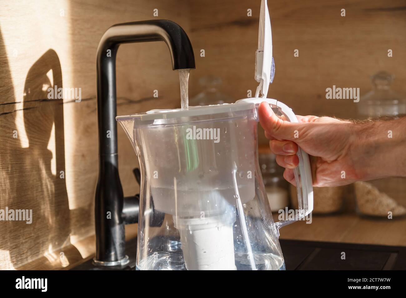 Water filter jug in kitchen sink, filling up Stock Photo Alamy