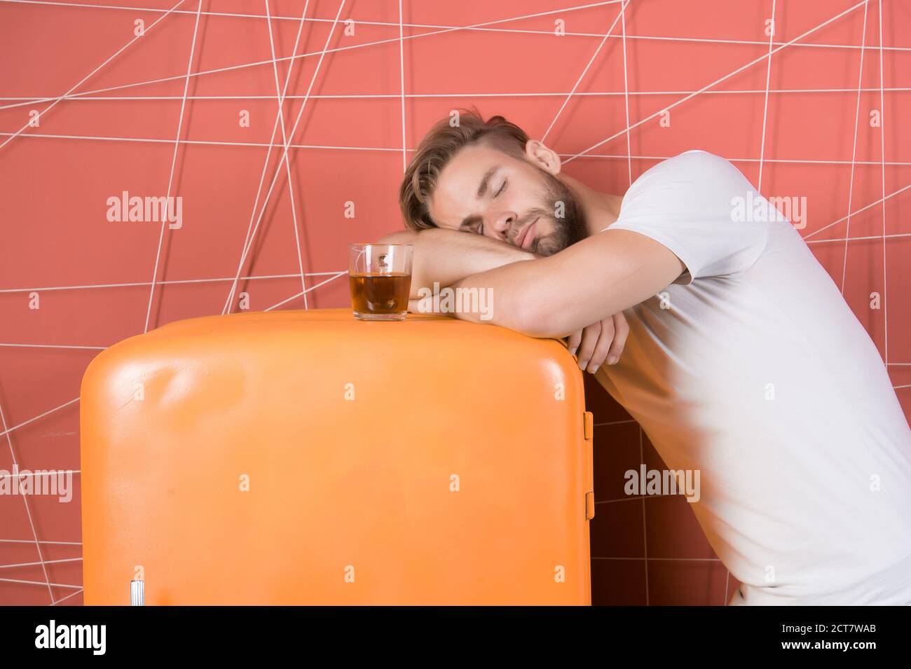 Man falling asleep during his breakfast after overtime work. Stock Photo