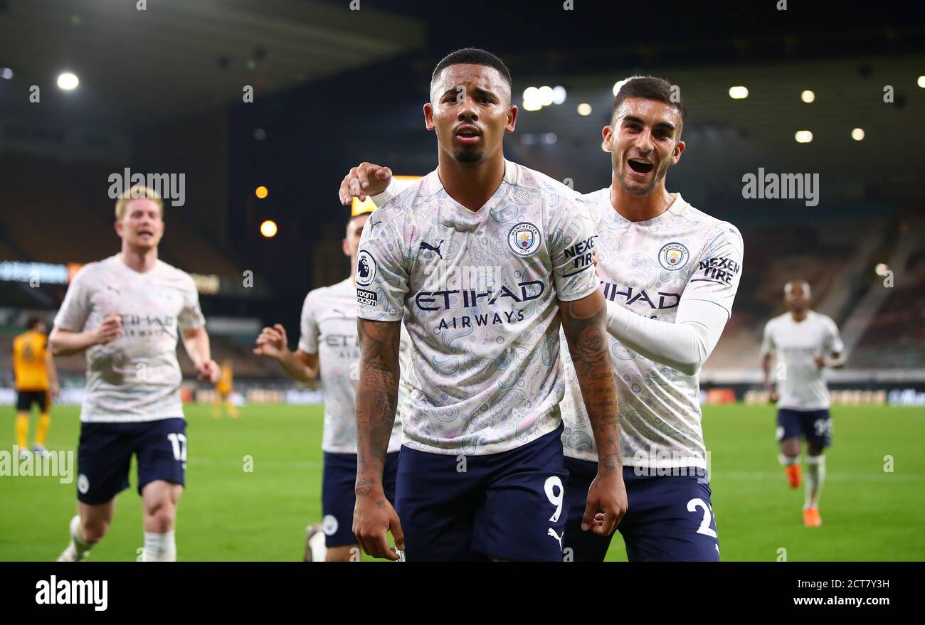 Manchester City's Gabriel Jesus celebrates scoring his side's third goal of the game with team-mate Ferran Torres (right) during the Premier League match at Molineux, Wolverhampton. Stock Photo