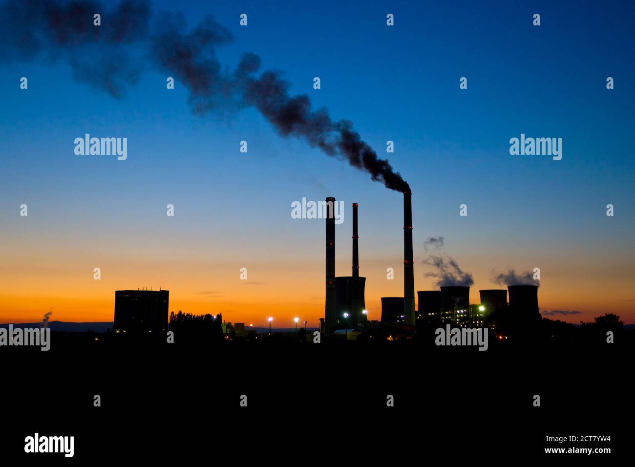 Coal burning power plant under the evening sky Stock Photo