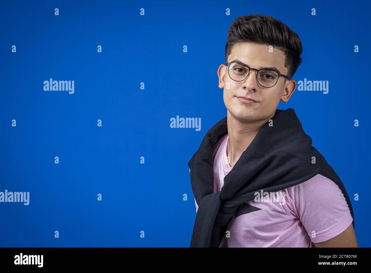 Sweater tied around neck hi-res stock photography and images - Alamy