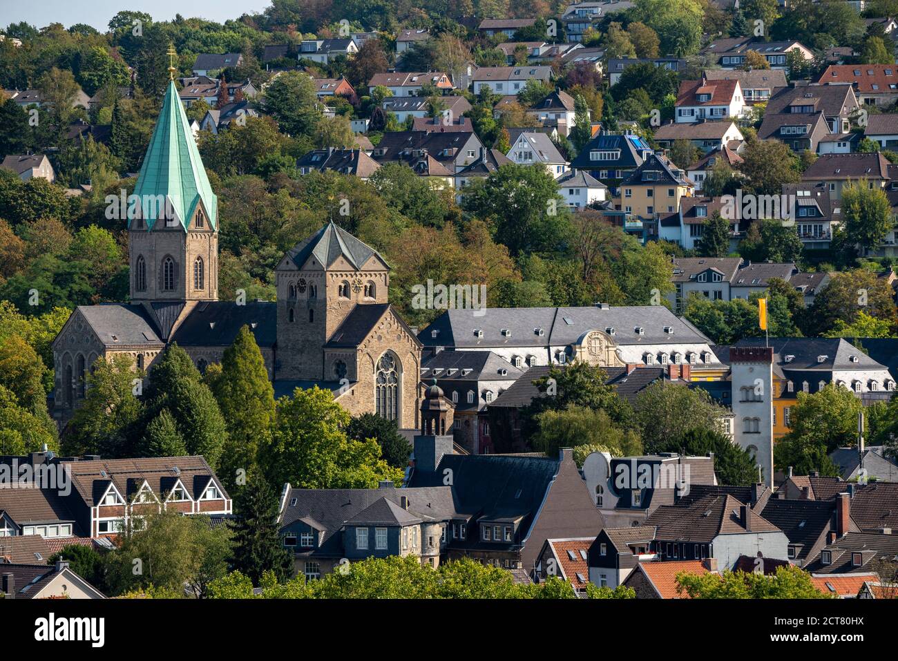 St. Ludgerus Church, in Essen-Werden, abbey church, with the shrine of St. Ludgerus, in the crypt, on the right building of the Folkwang University of Stock Photo