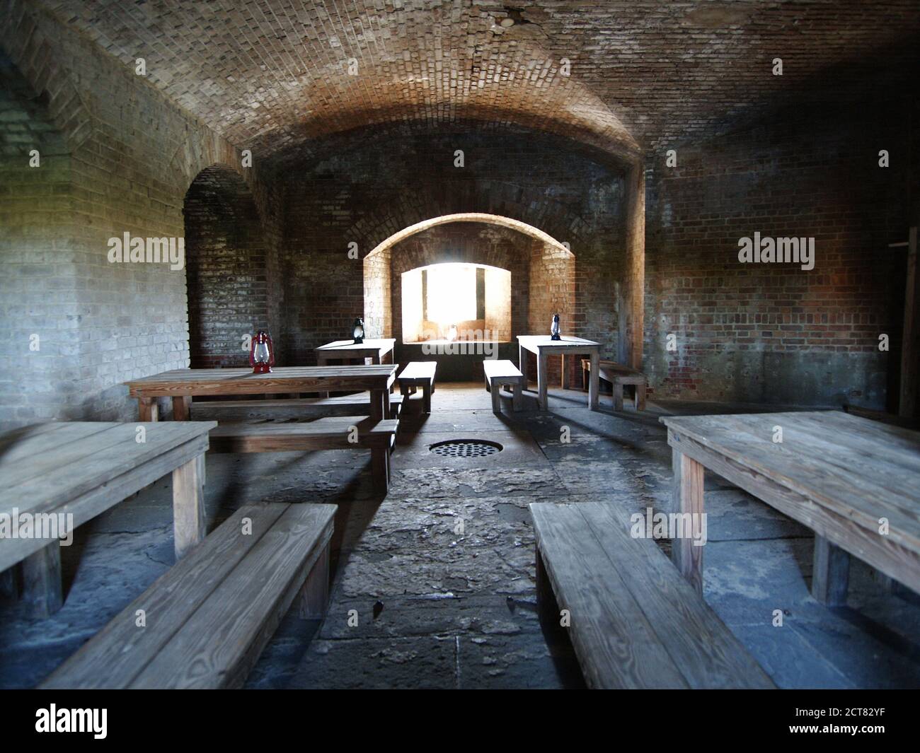 Archival view of room with tables inside Fort Zachary Taylor State Park in Key West Florida. Stock Photo