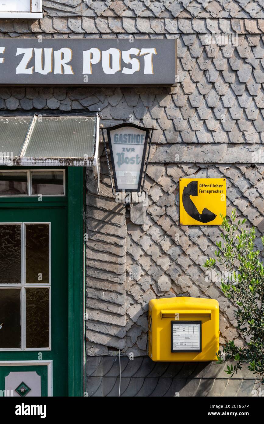 Gasthof zur Post, in Sauerland, Arnsberg Forest, mailbox, mailbox, public telephone, old style, NRW, Germany Stock Photo