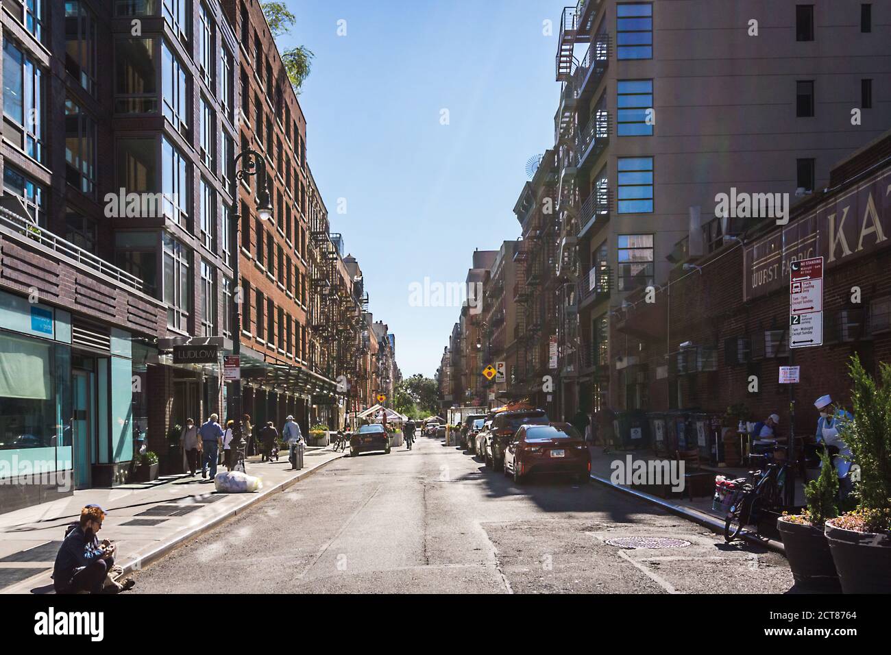 Lower East side block with apartment buildings and outdoor seating Stock Photo Alamy
