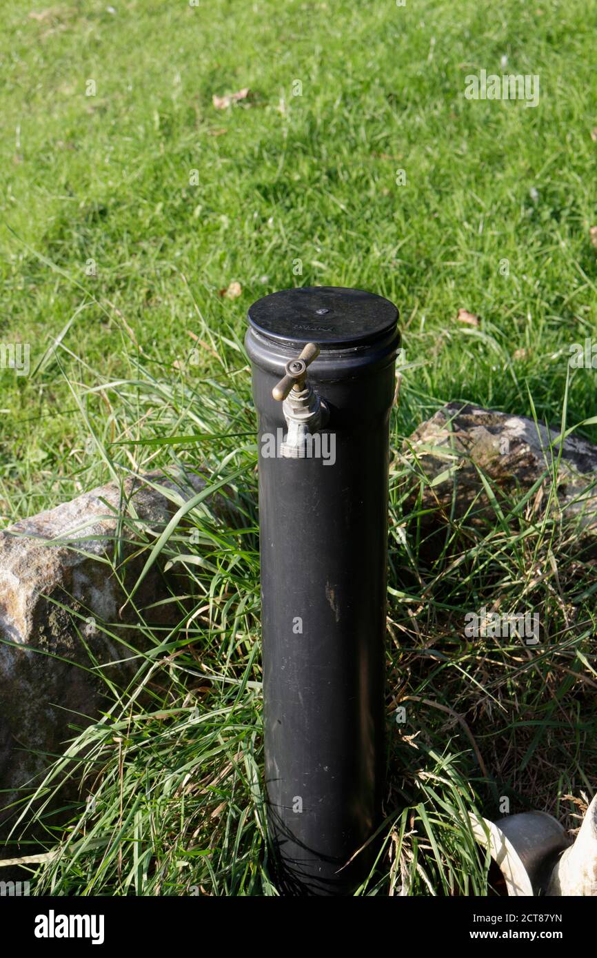 Water stand pipe tap, with plastic shround Stock Photo Alamy