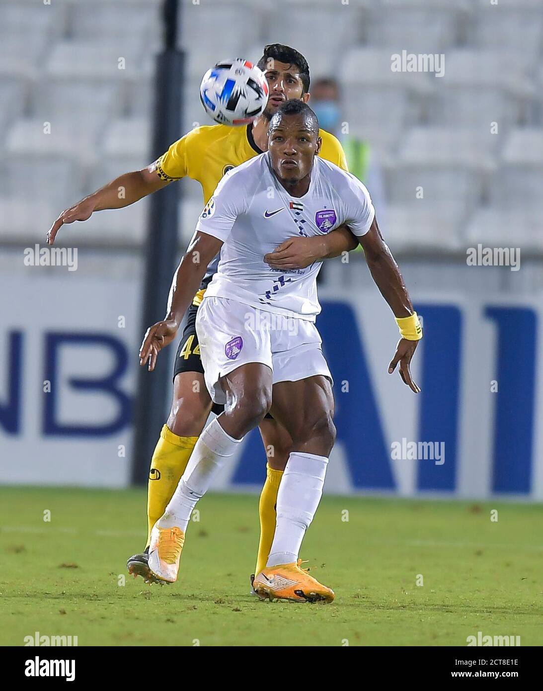 Doha, Qatar. 21st Sep, 2020. Rayan Yaslam (R) of Al Ain FC vies