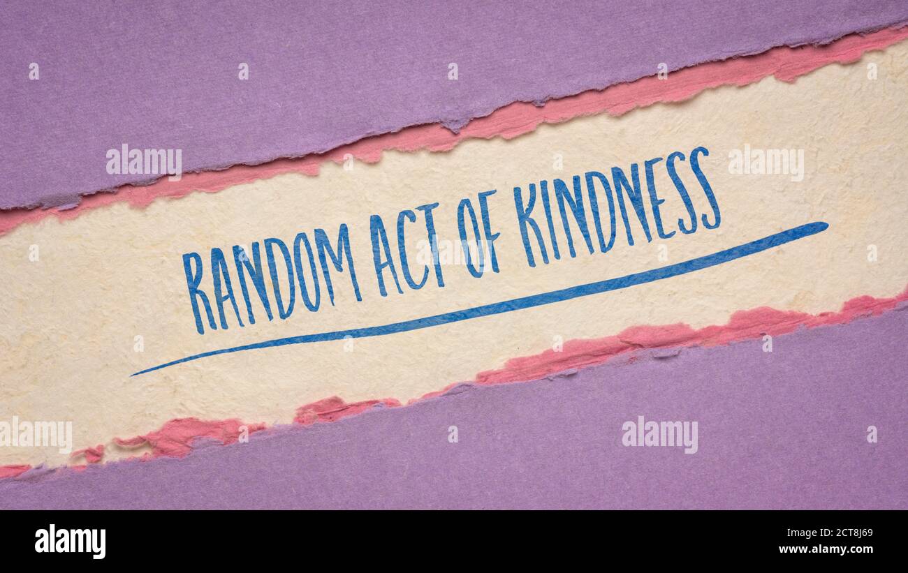 random act of kindness inspirational note - handwriting on a handmade paper, social concept Stock Photo