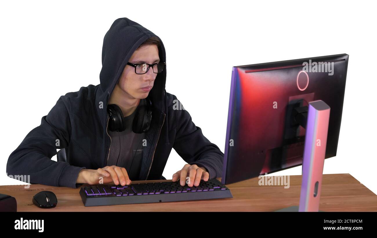 Hacker in glasses breaking code on white background. Stock Photo