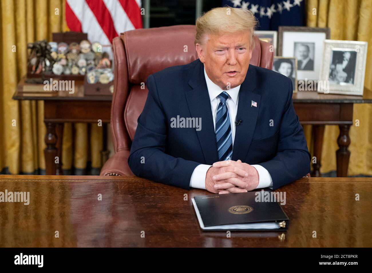 WASHINGTON DC,USA- 11 March 2020 - President Donald J Trump addresses the nation from the Oval Office of the White House Wednesday evening, March 11, Stock Photo