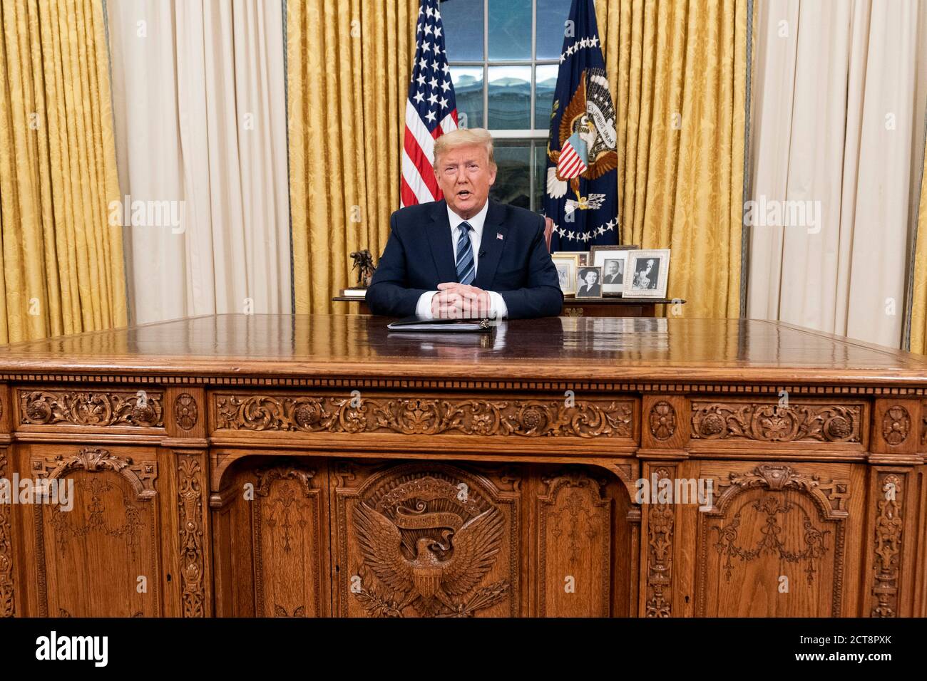 WASHINGTON DC,USA- 11 March 2020 - President Donald J Trump addresses the nation from the Oval Office of the White House Wednesday evening, March 11, Stock Photo