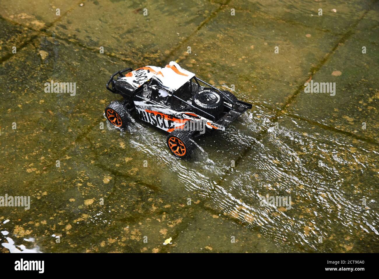toy car running in water Stock Photo Alamy