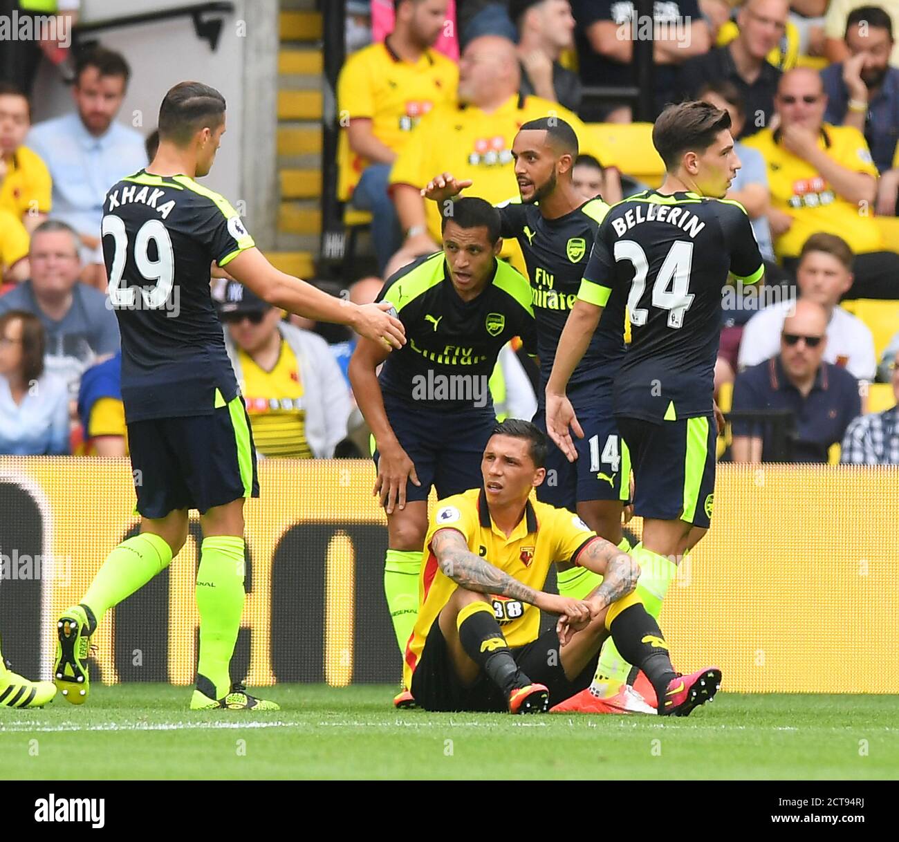 ALEXIS SANCHEZ CELEBRATES SCORING HIS HEADED GOAL FOR ARSENAL AND IT IS CONFIRMED TO HAVE CROSSED THE LINE BY GOAL-LINE TECHNOLOGY  Watford v Arsenal Stock Photo