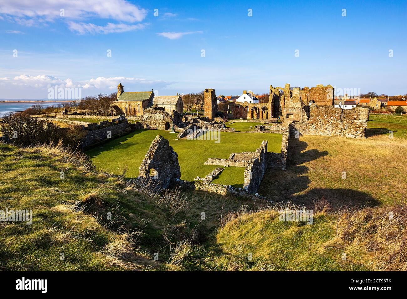 Ruins of Lindisfarne Priory on the Holy Island of Lindisfarne, Northumberland, England. Stock Photo