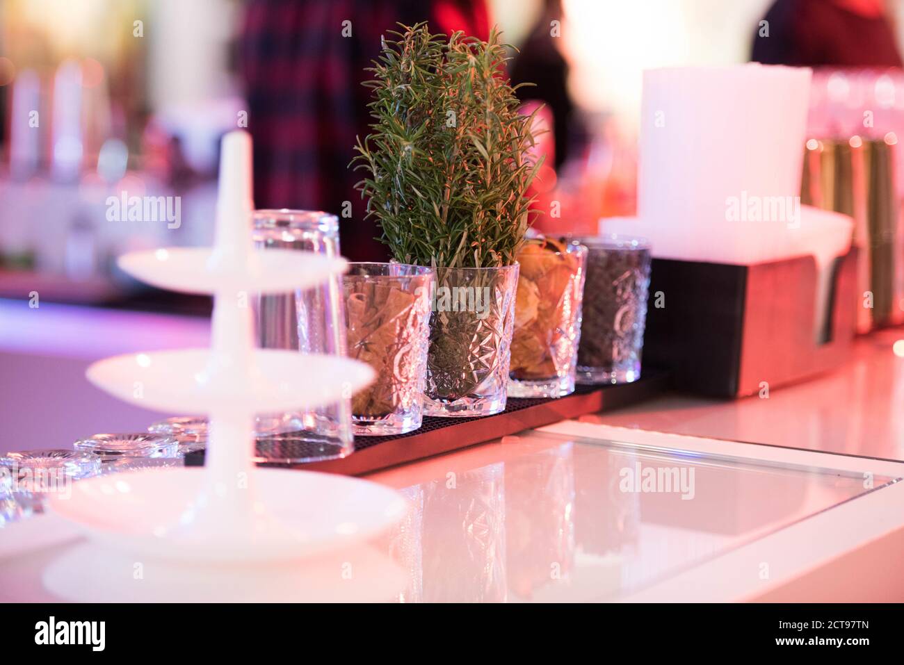 Closeup shot of condiments and herb rack on a smooth surface Stock Photo