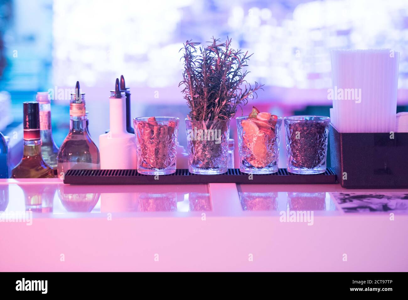 Closeup shot of condiments and herb rack on a smooth surface Stock Photo