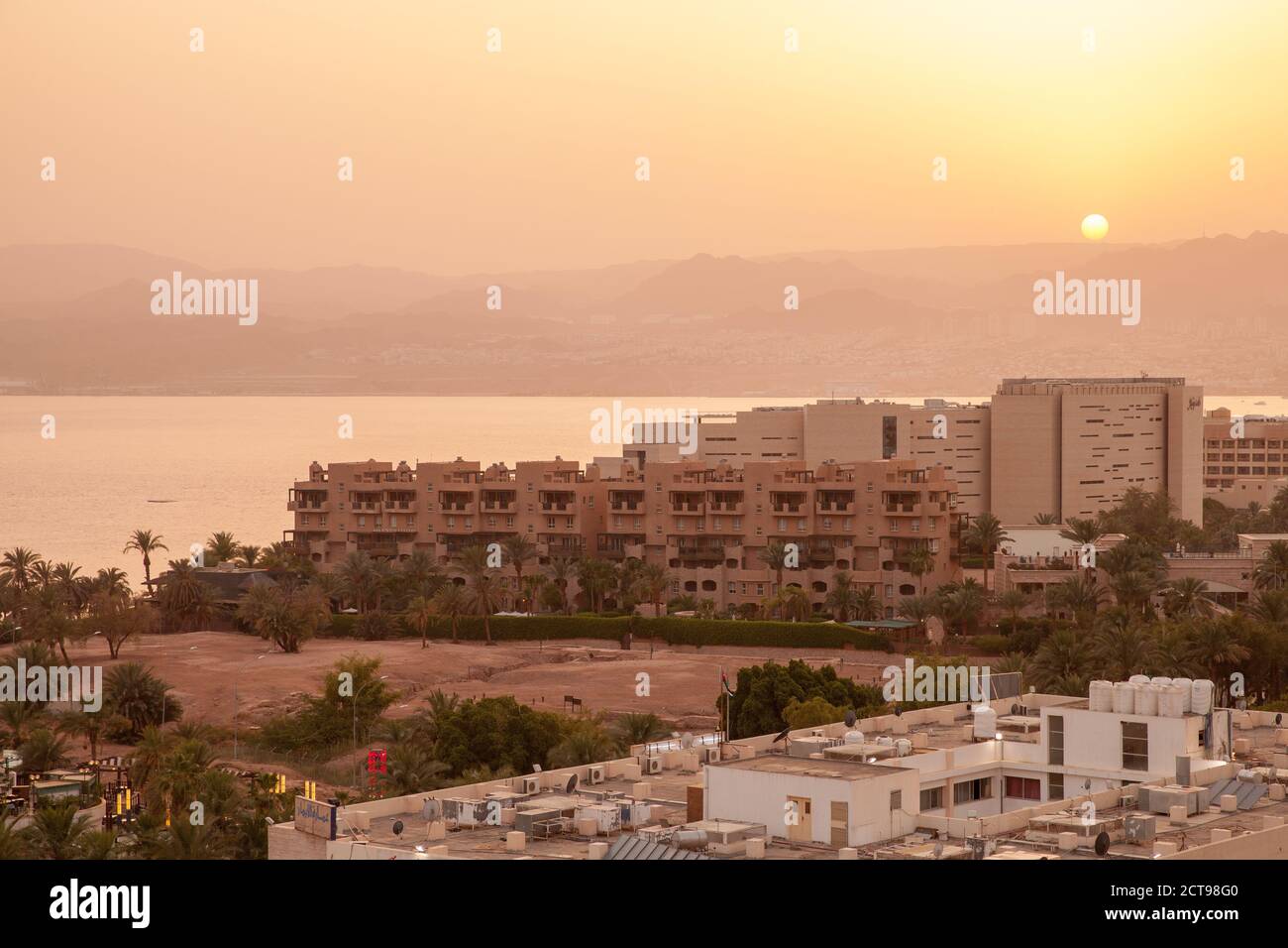 Aqaba, Jordan - May 18, 2018: Coastal cityscape of Aqaba city at sunset, bird eye view Stock Photo