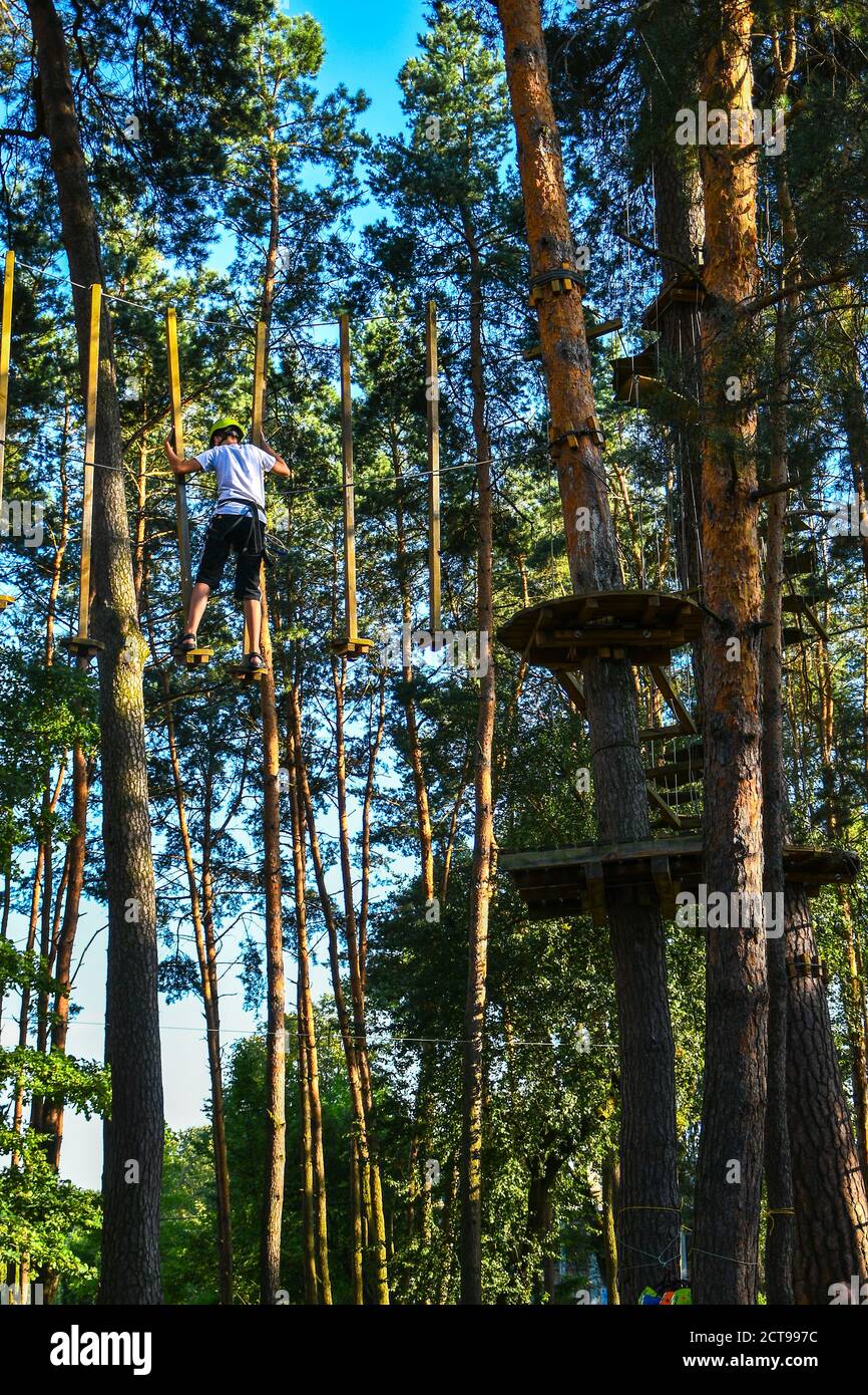 Adventure Climbing High Wire Park Close Up Young Boy In Helmet Having Fun And Playing At Adventure Park Holding Ropes And Climbing Wooden Stairs Stock Photo Alamy Adventure Climbing High Wire Park Close Up Young Boy In Helmet Having Fun And Playing At Adventure Park Holding Ropes And Climbing Wooden Stairs Stock Photo Alamy