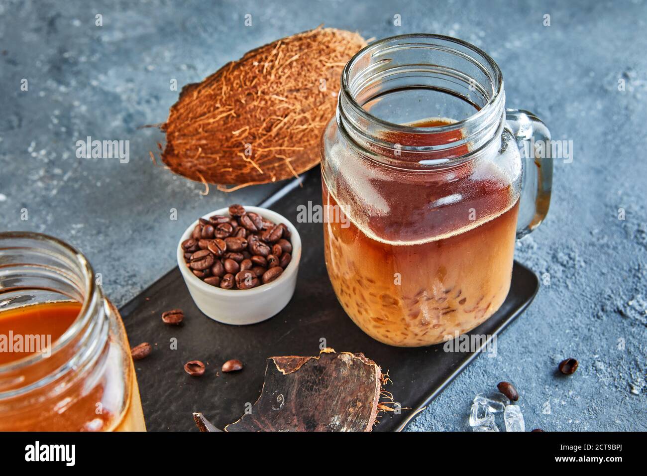 Thai Iced Coffee with Coconut Milk with Crushed Ice in a Mason Jar
