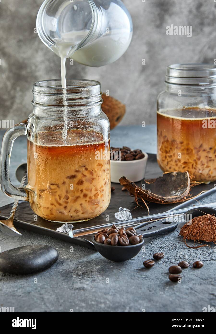 Thai Iced Coffee with Coconut Milk with Crushed Ice in a Mason Jar