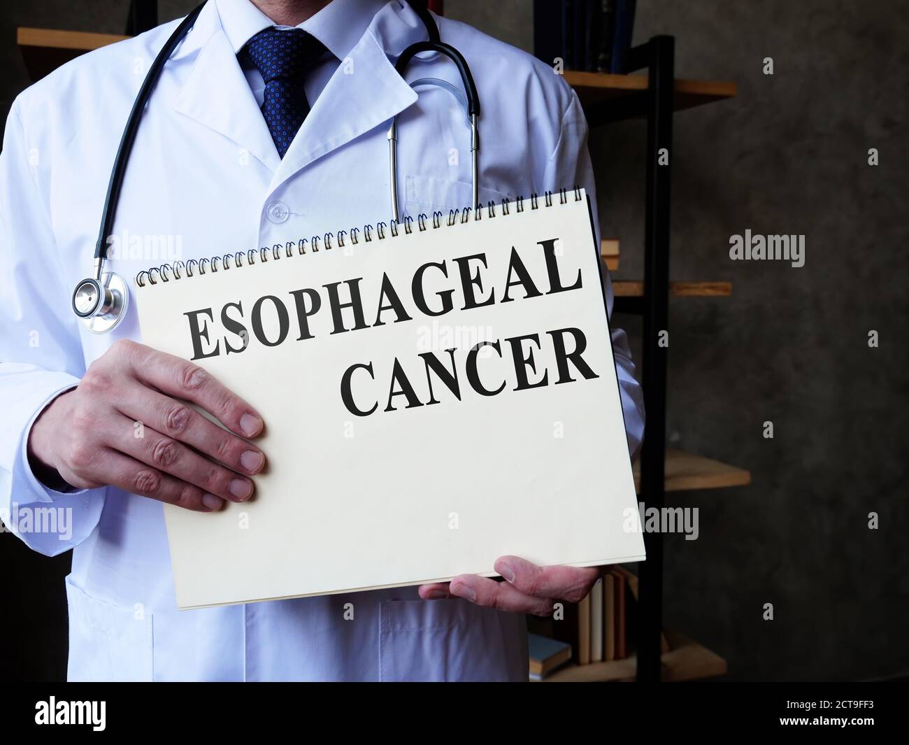 Esophageal cancer concept. Doctor holds medical papers. Stock Photo
