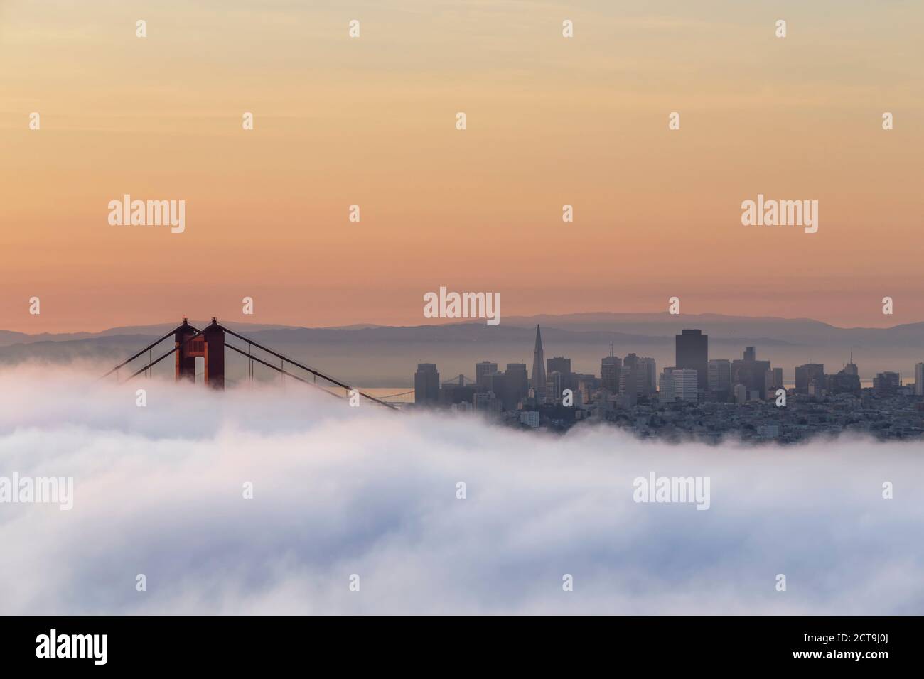 USA, California, San Francisco, skyline and Golden Gate Bridge in fog seen from Hawk Hill Stock Photo