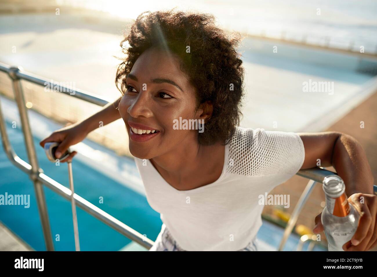 African woman swimming pool hi-res stock photography and images - Alamy