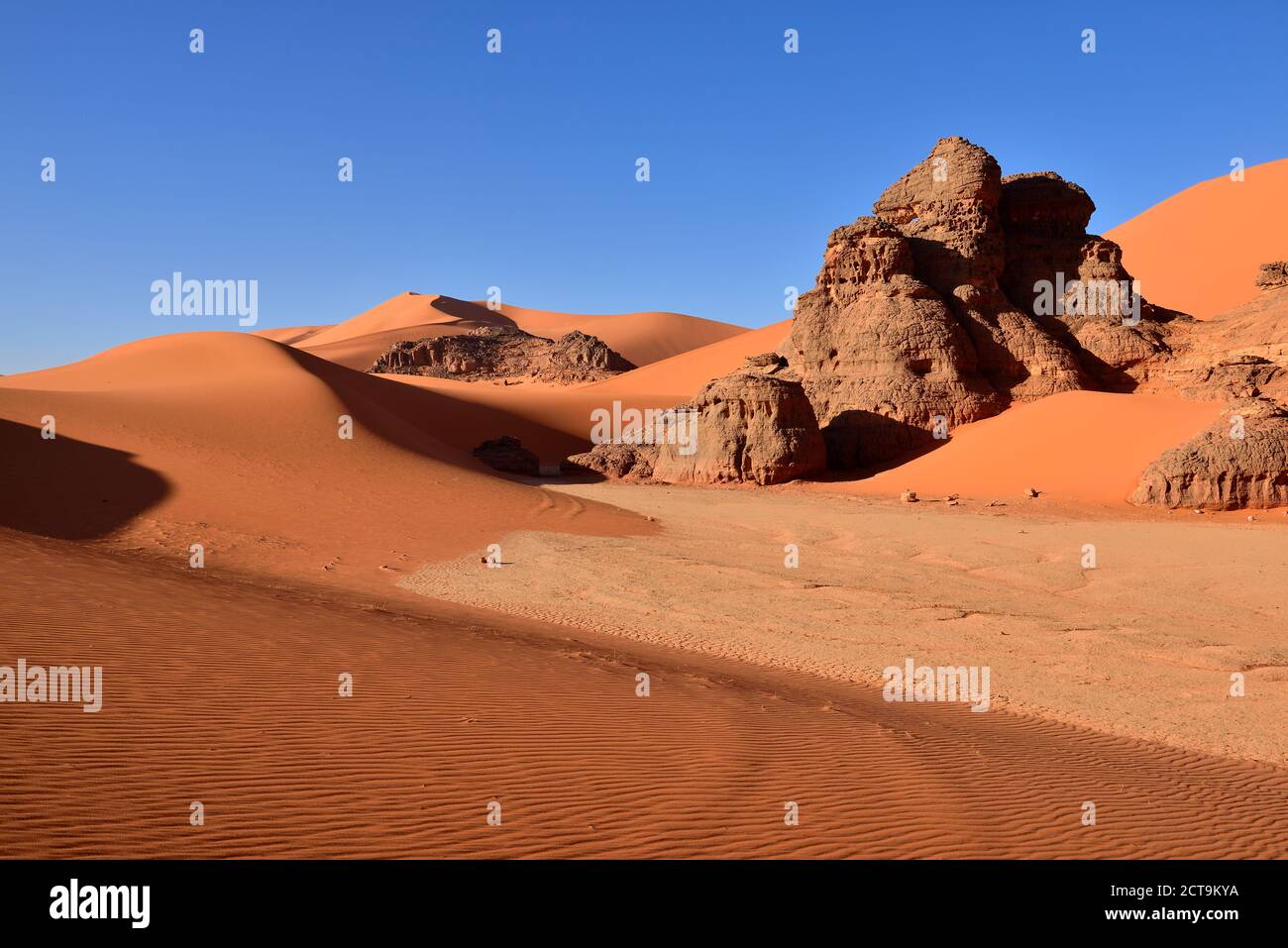 Algeria, Sahara,  Tassili N'Ajjer National Park, Tadrart, rocks and sand dunes at Tin Merzouga Stock Photo