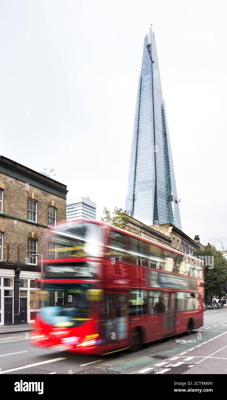 UK, London, view to the skyscraper The Shard and double-deck bus in front Stock Photo