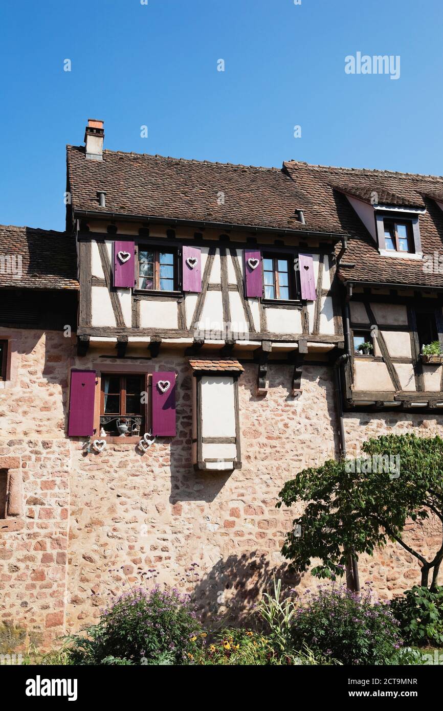 France, Alsace, Haut-Rhin, Riquewihr, Town wall with integrated houses Stock Photo