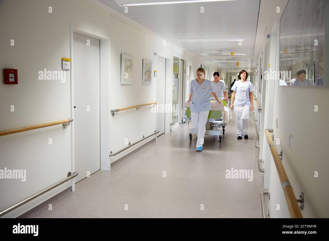 Germany, Freiburg, Nurses moving hospital bed Stock Photo Alamy