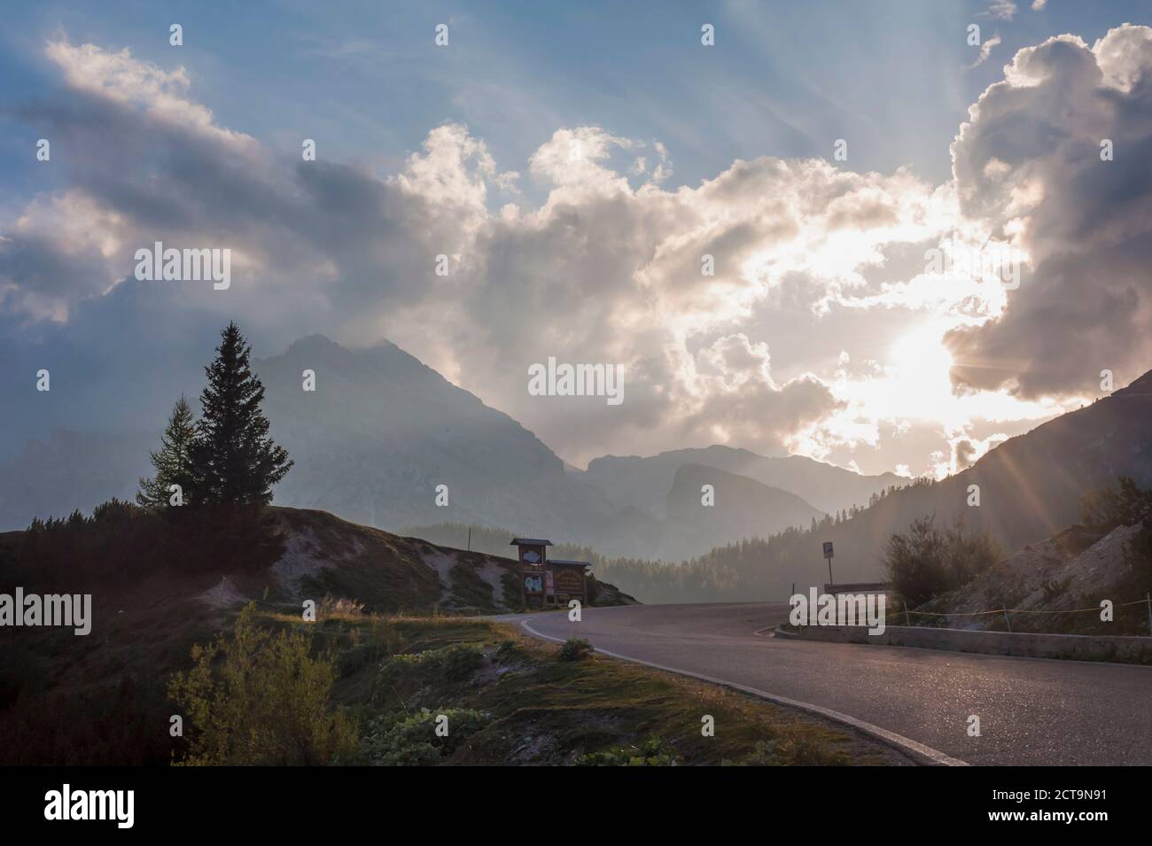 Italy, Dolomite Alps, road at evening twilight Stock Photo