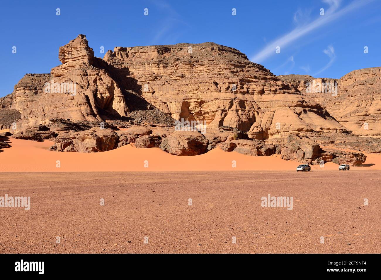 Algeria, Sahara, Tassili N'Ajjer National Park, two pickup vehicles in Oued In Djeran Stock Photo