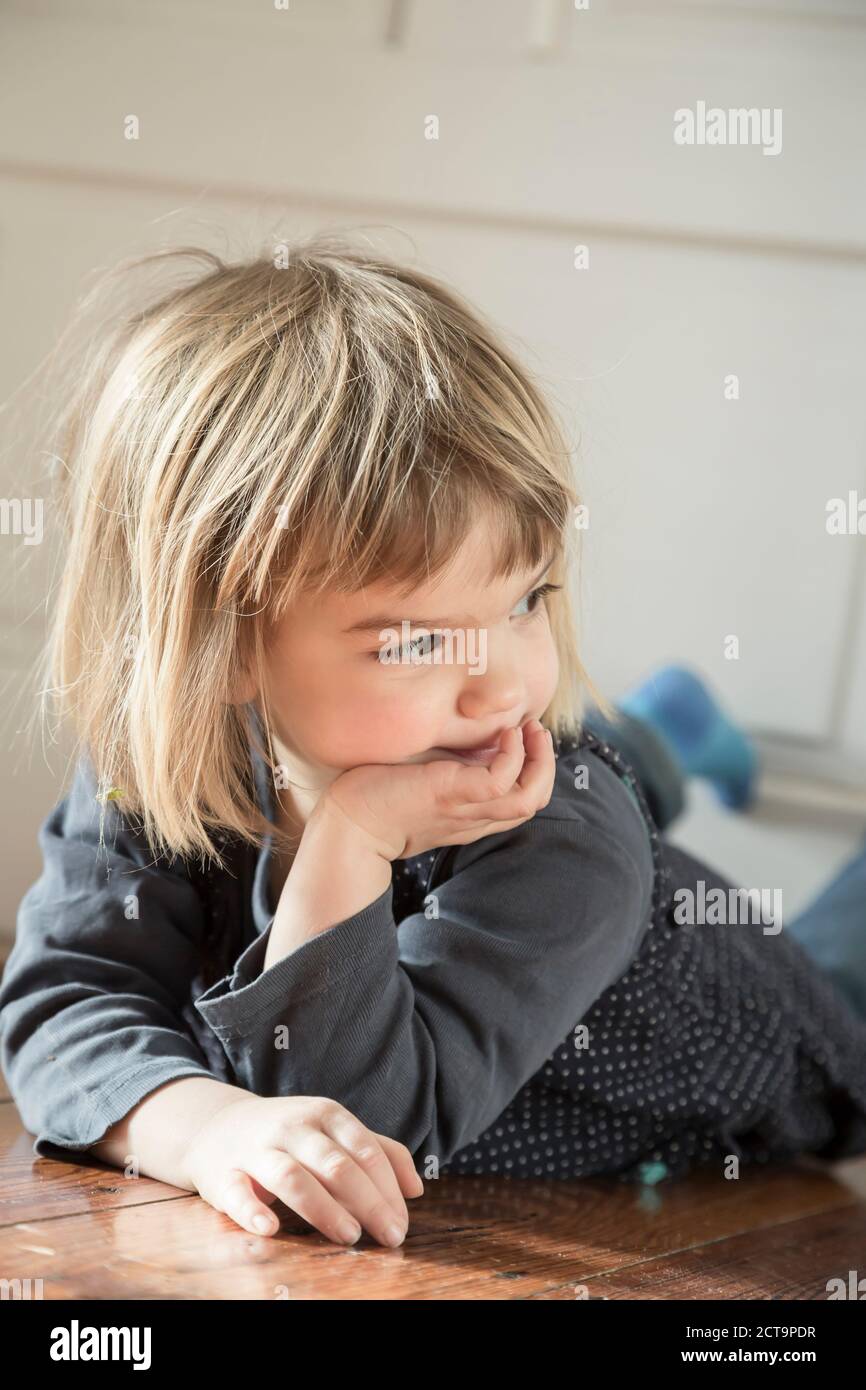 Little girl looking at something Stock Photo