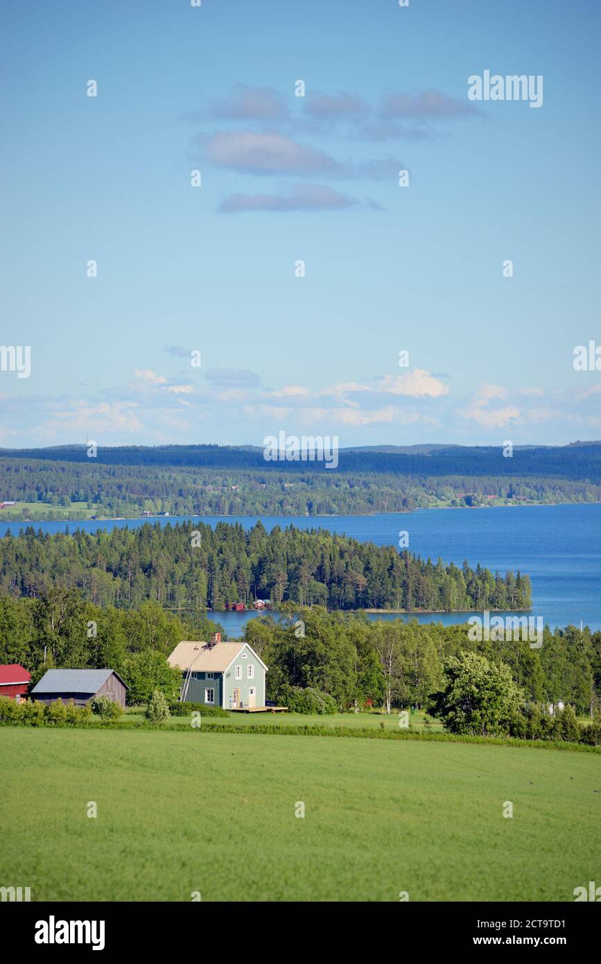 Sweden, Brunflo, Houses by the lakeside at Locknesjoen Stock Photo