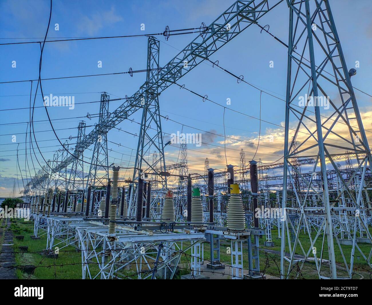 High voltage power transformer substation. Hight voltage tower with blue sky  Stock Photo