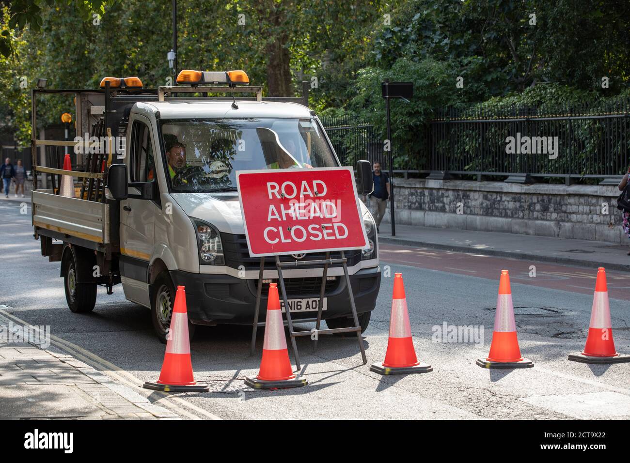 Tarmac roads are resurfaced as road works take place on City Road in the heart of the City of London, England, UK Stock Photo