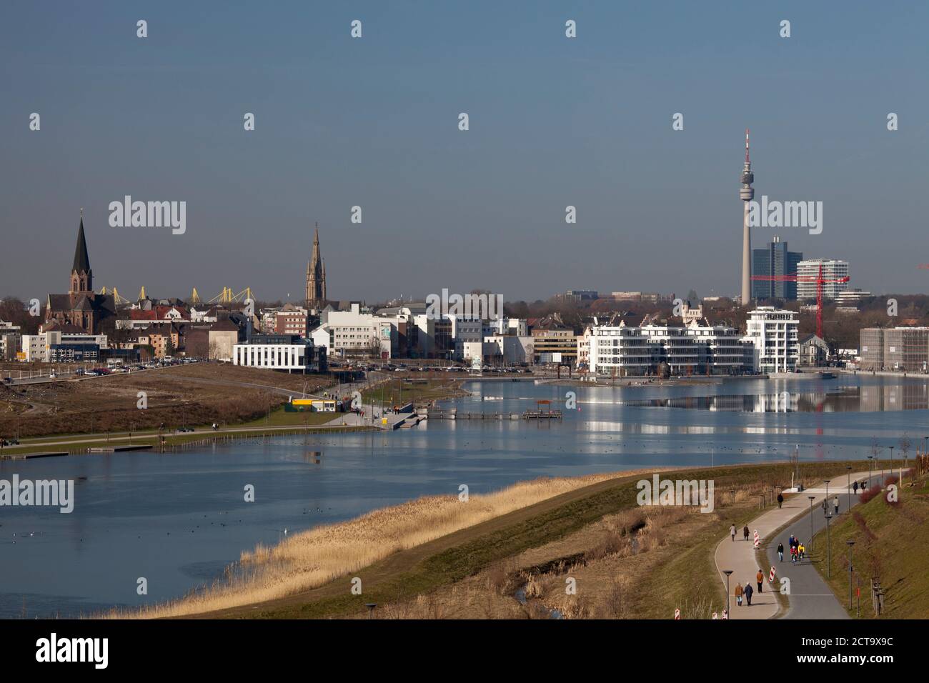 Germany, North Rhine-Westphalia, Dortmund-Hoerde, Phoenix-See, development area, in the background football stadium Signal-Iduna-Park Stock Photo