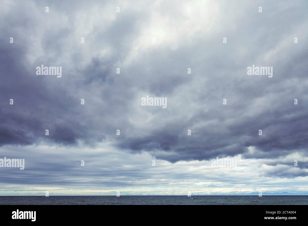New Zealand, Golden Bay, Totaranui, view to sea and clouded sky Stock Photo