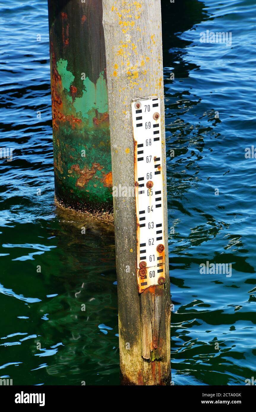 Gemany, Rusty water level meter  at baltic sea Stock Photo