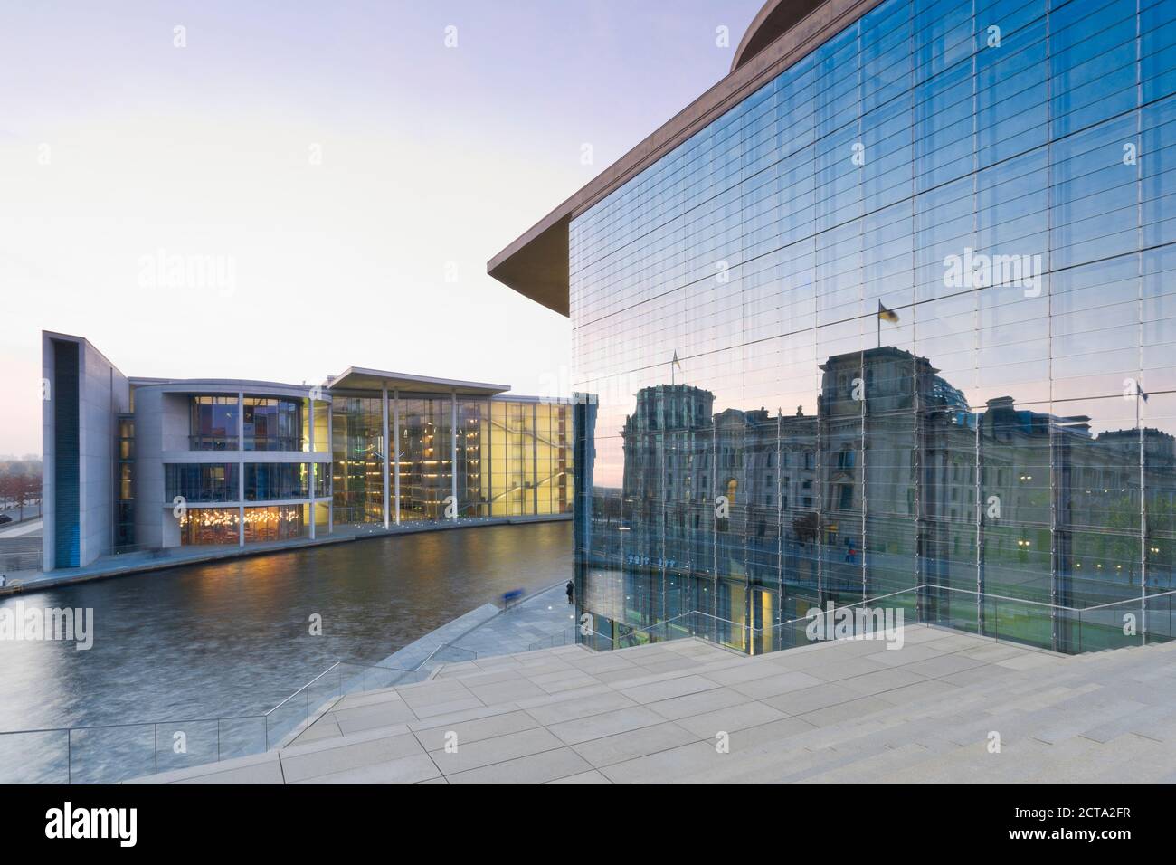 Germany, Berlin, Paul Loebe House, rigth reflection of Reichstag in the glass facade of Marie Elisabeth Lueders Building Stock Photo