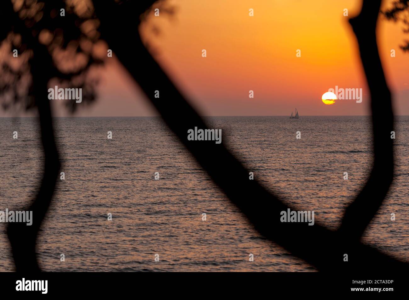 Sunset over boat on sea hi-res stock photography and images - Alamy