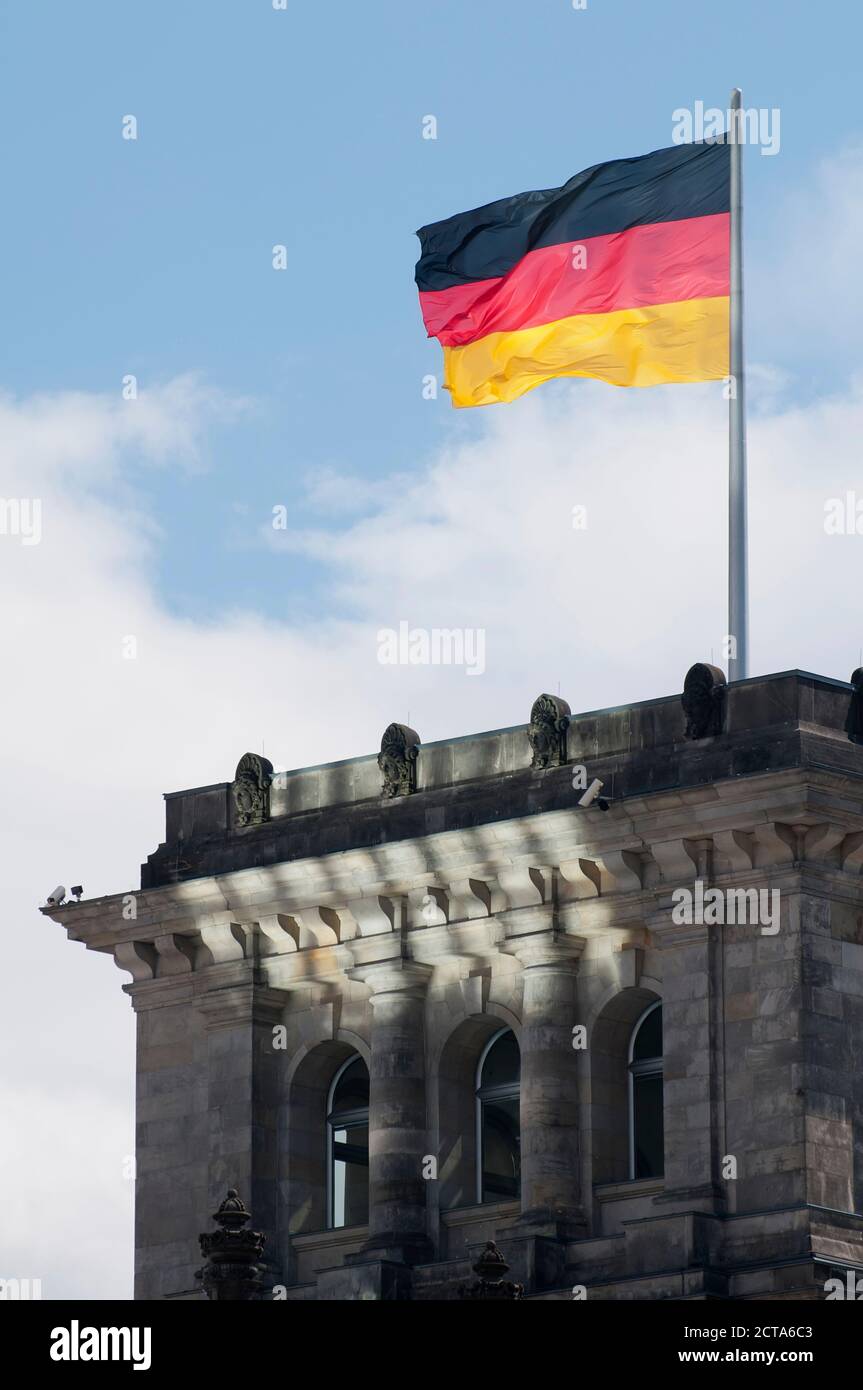 Germany, Berlin, German flag at Reichstag Building Stock Photo