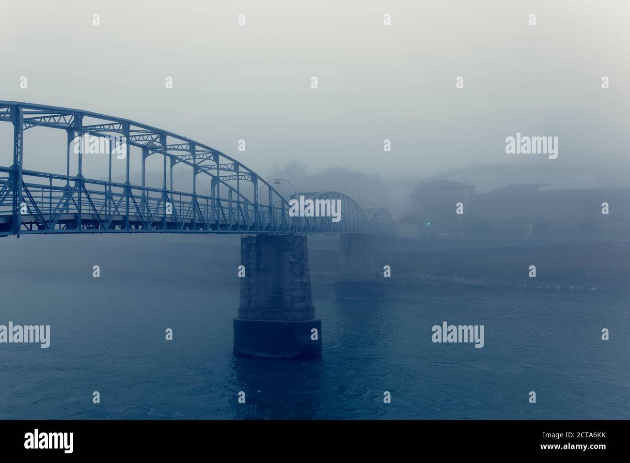 Austria, Salzburg State, Salzburg, bridge over Salzach river in fog Stock Photo