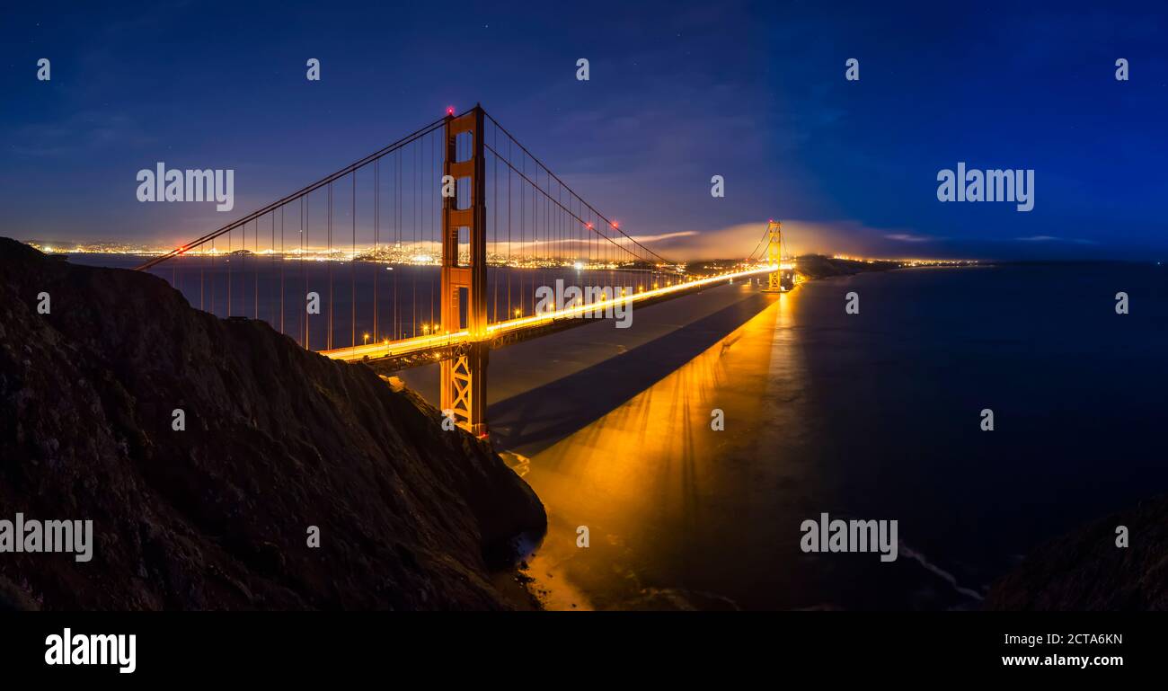 USA, California, San Francisco, skyline and Golden Gate Bridge at the blue hour seen from Hawk Hill Stock Photo