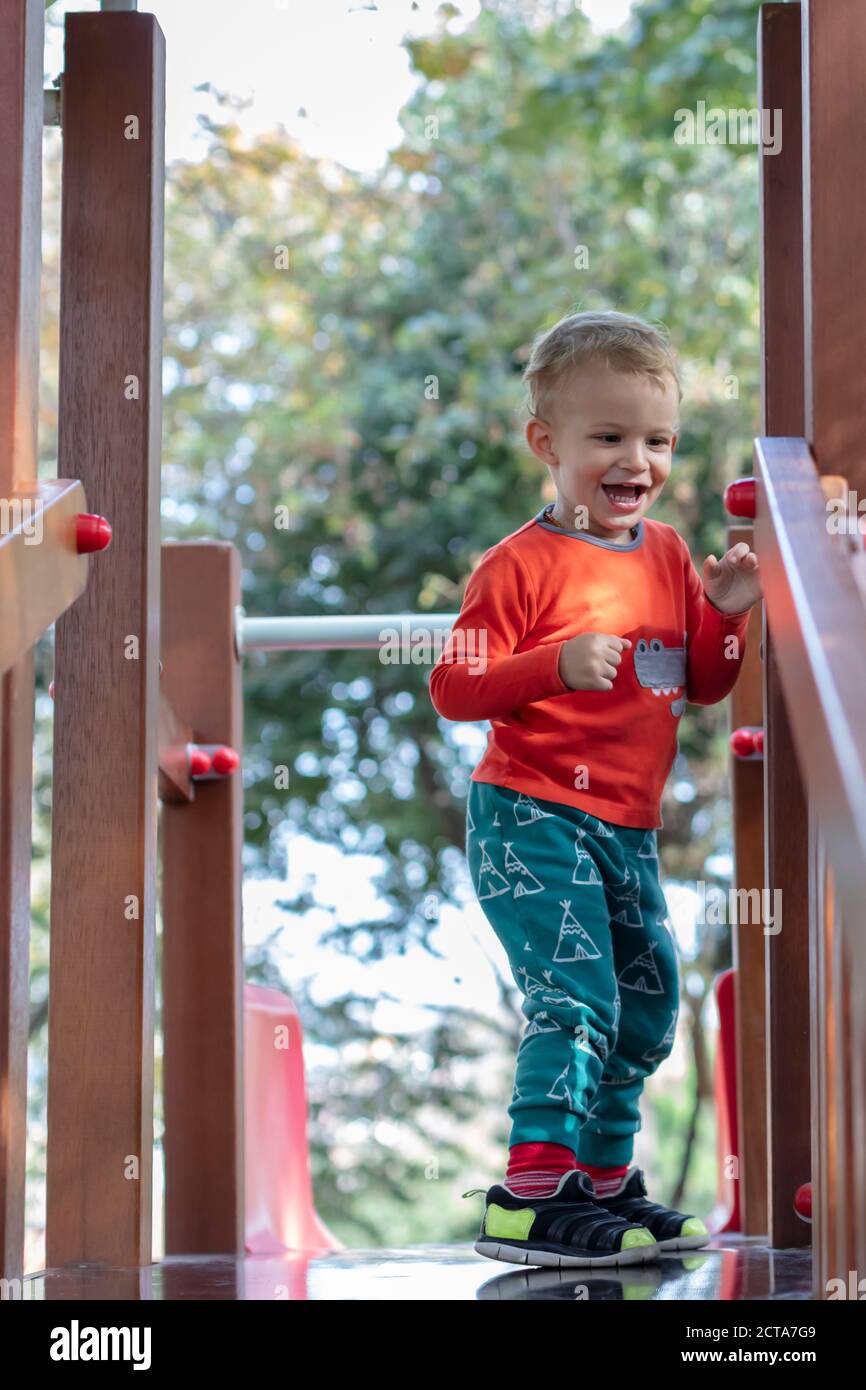 Little Boy Playing at Playground Stock Photo - Alamy
