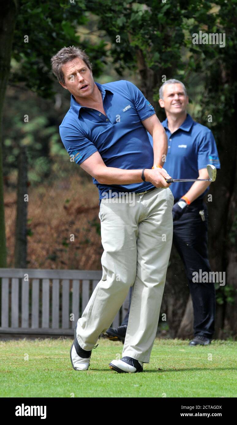 CHISWICK,LONDON,UK: JULY 16th 2010.  Actor Hugh Grant participates in the Leuka Charity Mini-Masters Golf at the Dukes Meadows Golf Course Chiswick. A Stock Photo