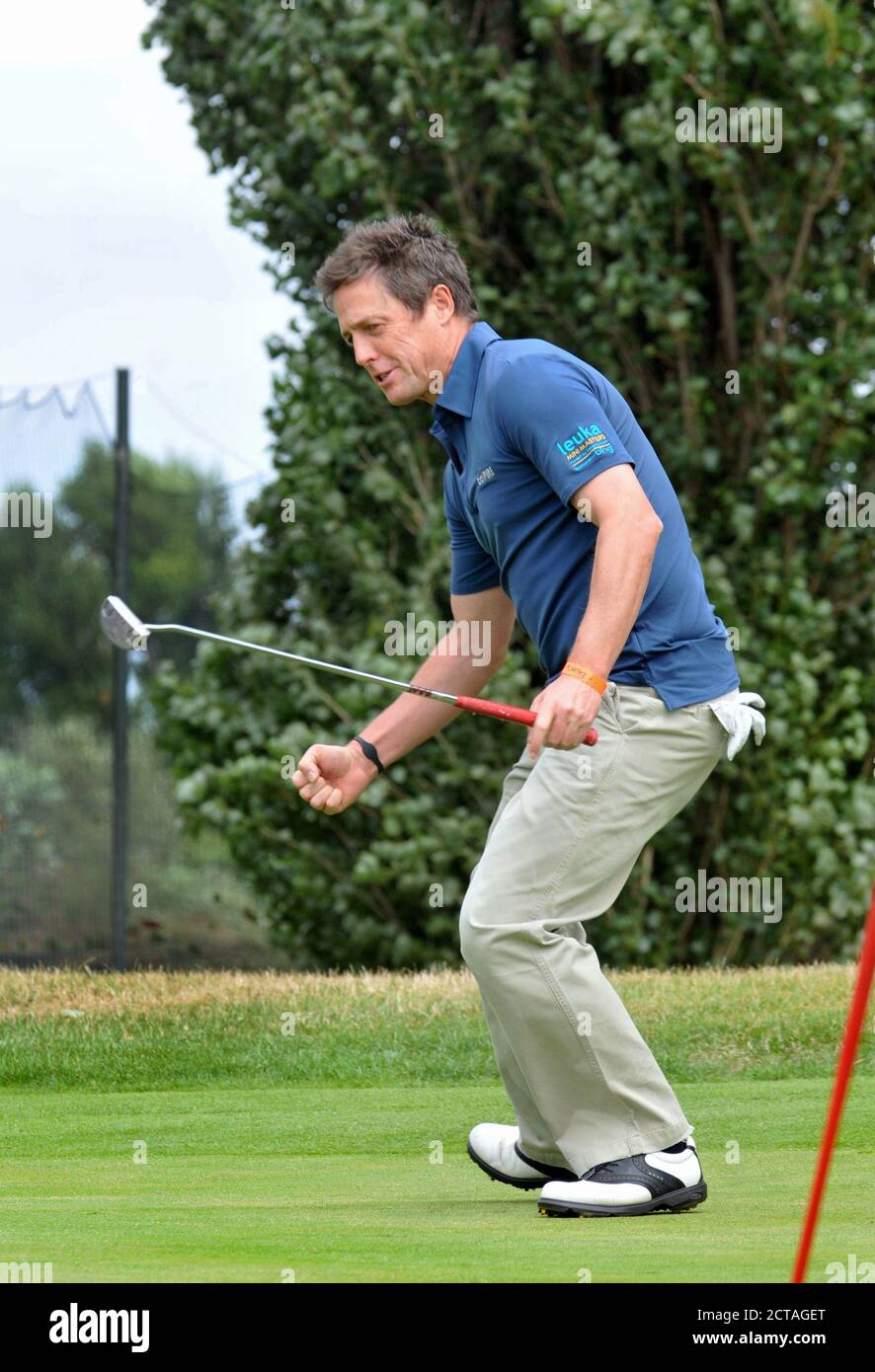 CHISWICK,LONDON,UK: JULY 16th 2010.  Actor Hugh Grant participates in the Leuka Charity Mini-Masters Golf at the Dukes Meadows Golf Course Chiswick. A Stock Photo