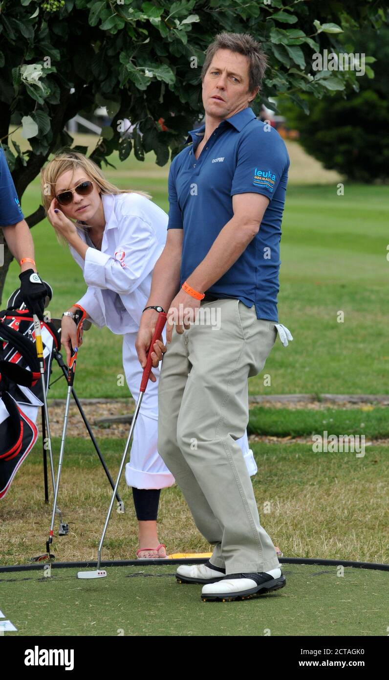 CHISWICK,LONDON,UK: JULY 16th 2010.  Actor Hugh Grant participates in the Leuka Charity Mini-Masters Golf at the Dukes Meadows Golf Course Chiswick. A Stock Photo